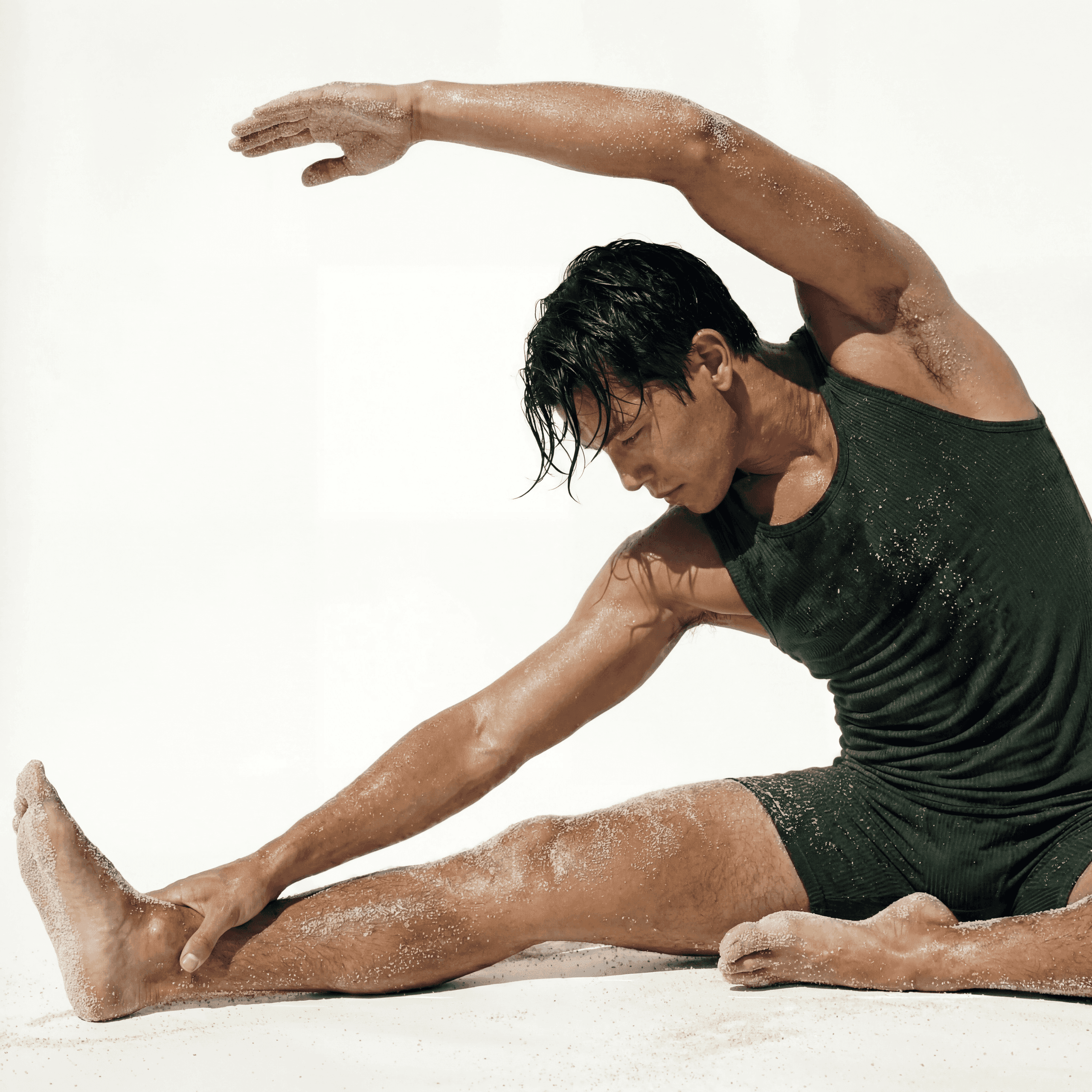 Post-workout mobility and side-stretch exercise during a private functional training session in Lisbon at MokoBoko studio